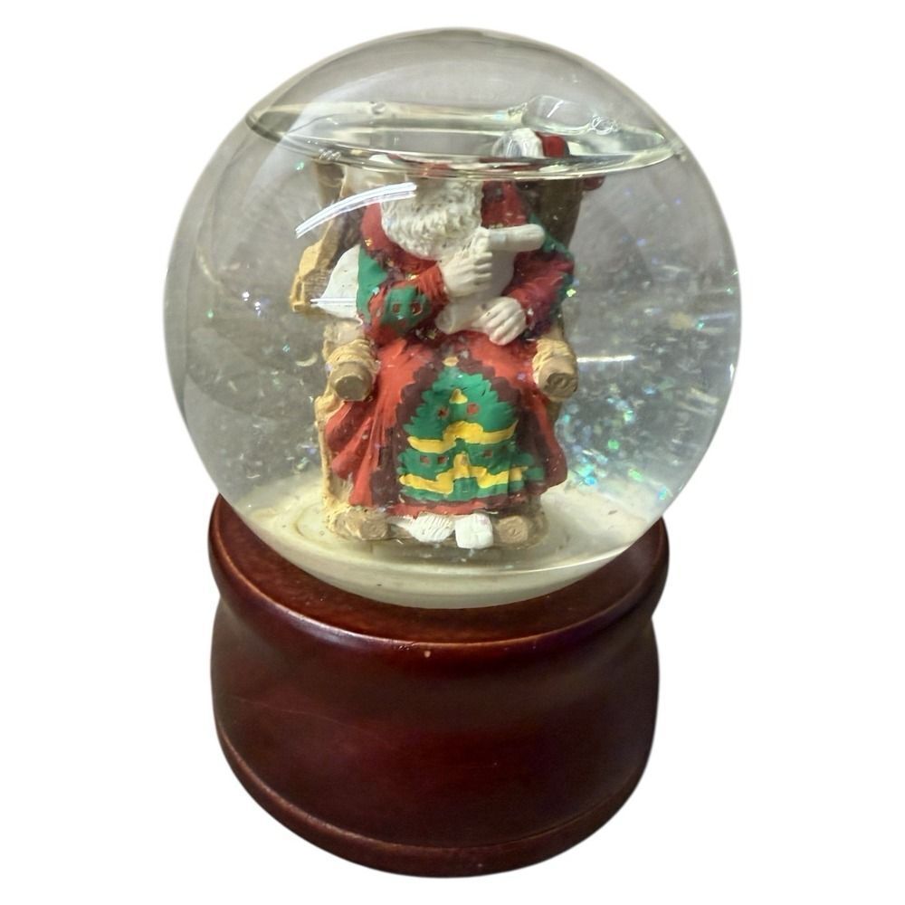 Vintage Silvestri Musical Snowglobe. Santa Claus seated in a rocking chair